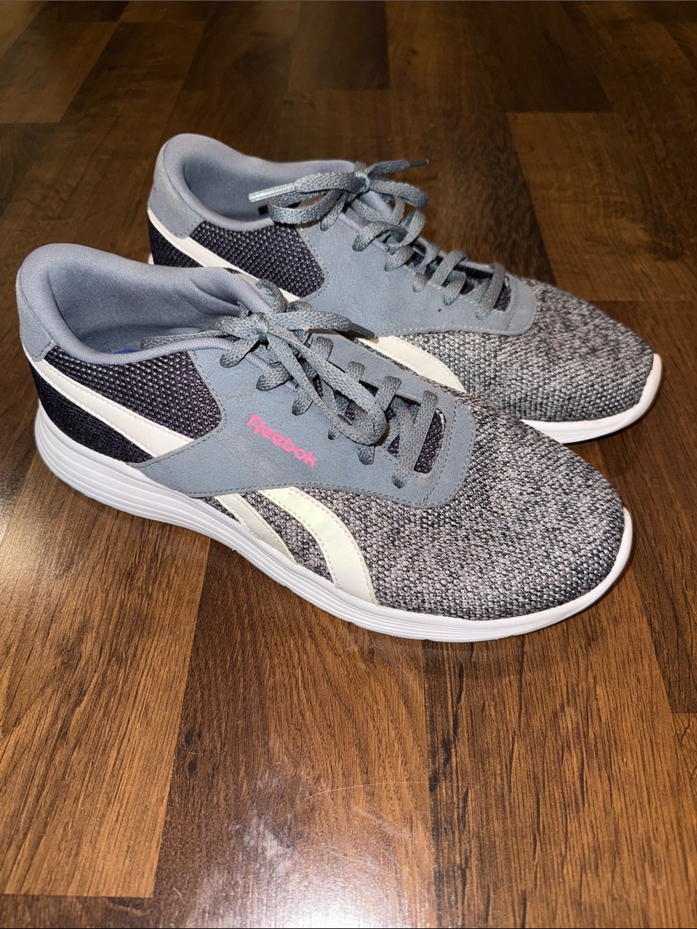 Women’s Reebok Gray Sneakers with Pink Logo (size 9.5)